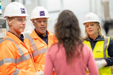 LRQA workers in meeting